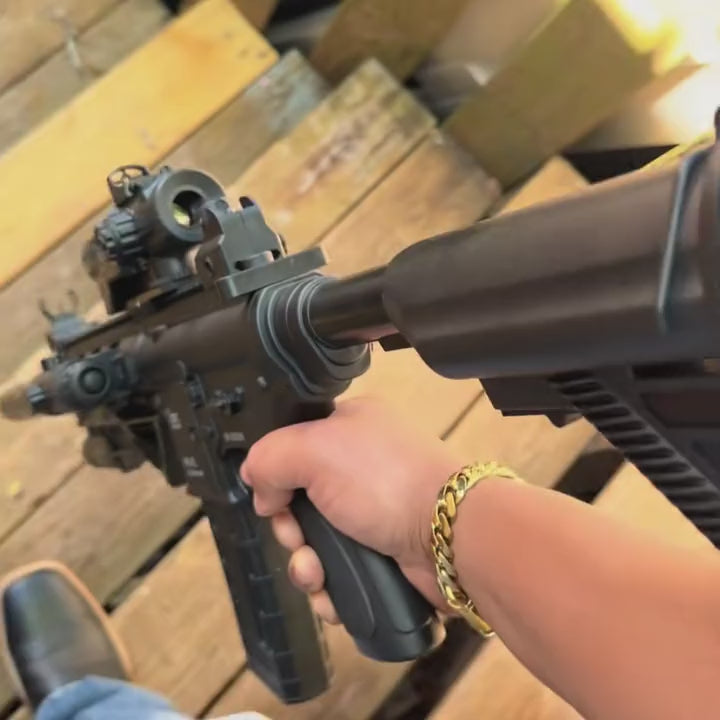 Hailstorm M4 Gel Blaster in hand with drum magazine